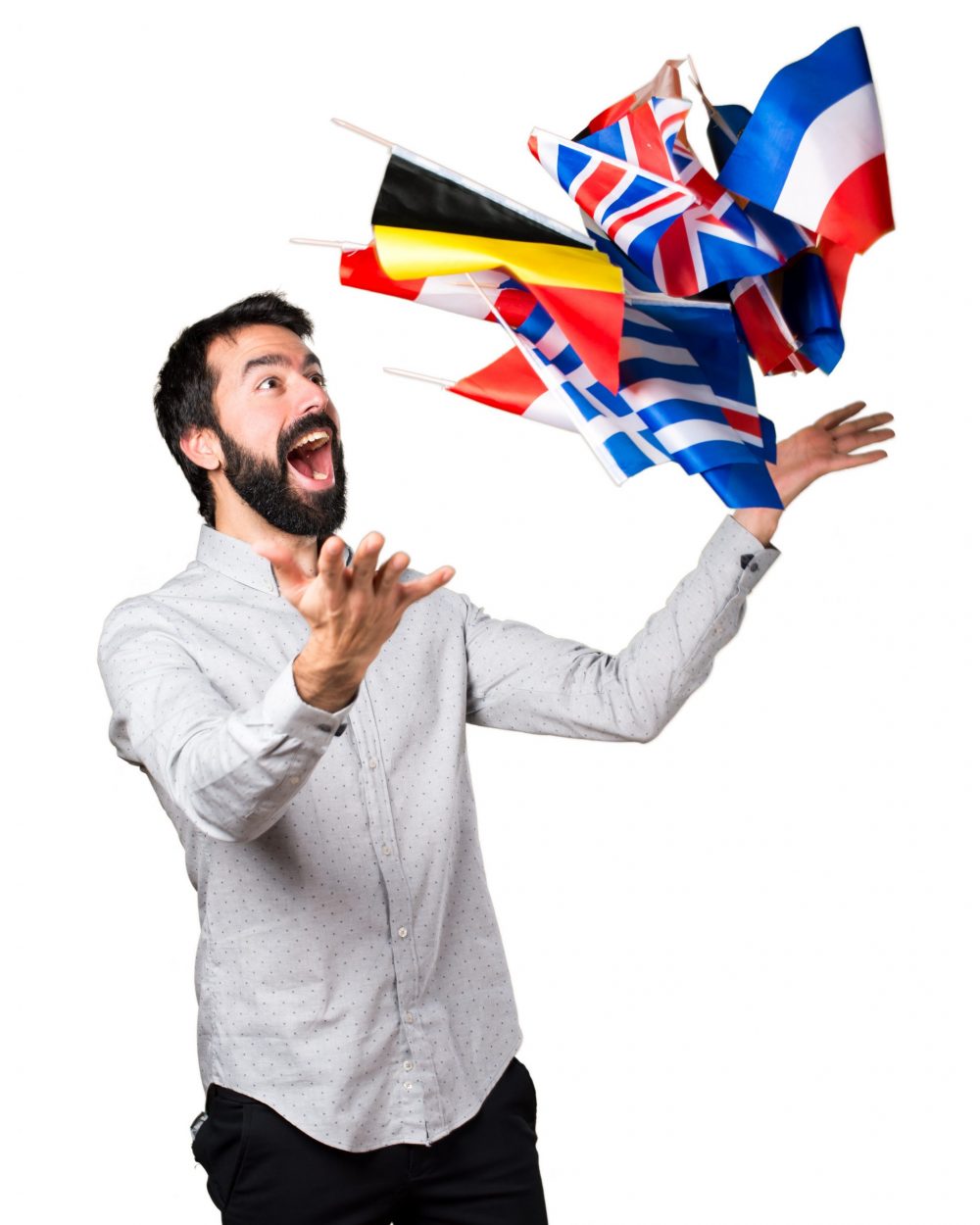 Happy handsome man with beard holding many flags